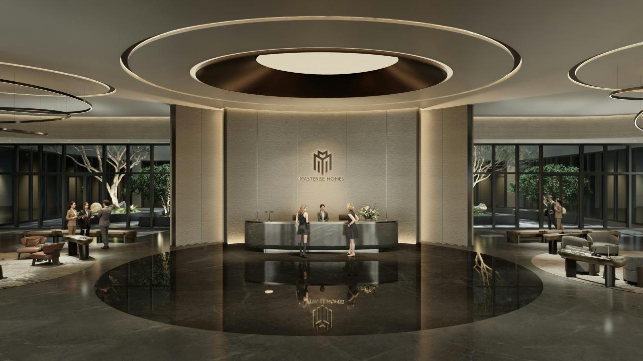 Lobi hotel modern dengan meja resepsionis dan area tempat duduk.